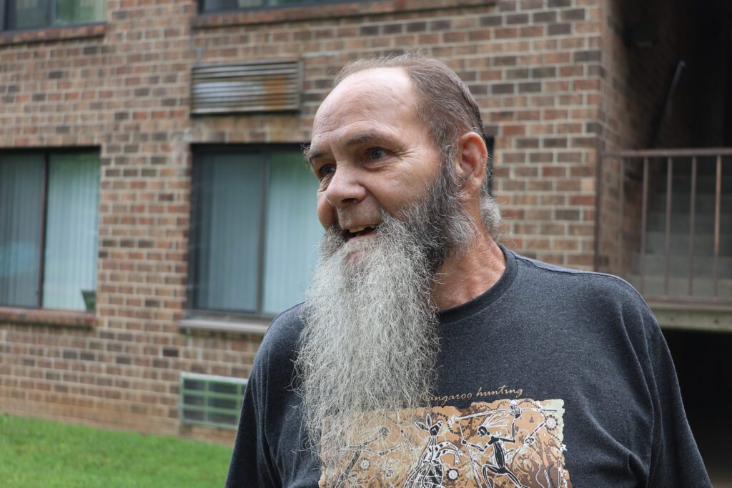 HB client, Jeff in front of his home