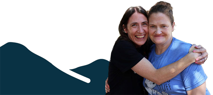 Happy program participant with a Homeward Bound team member