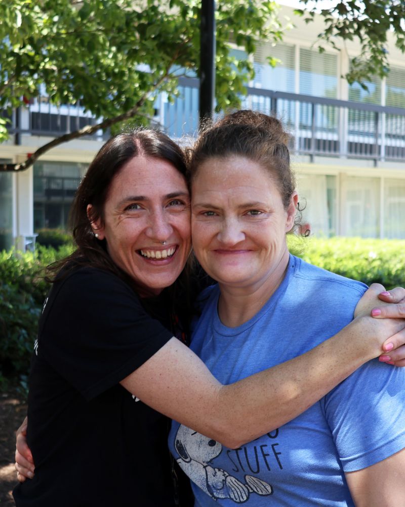 Homeward bound client outside of their new home